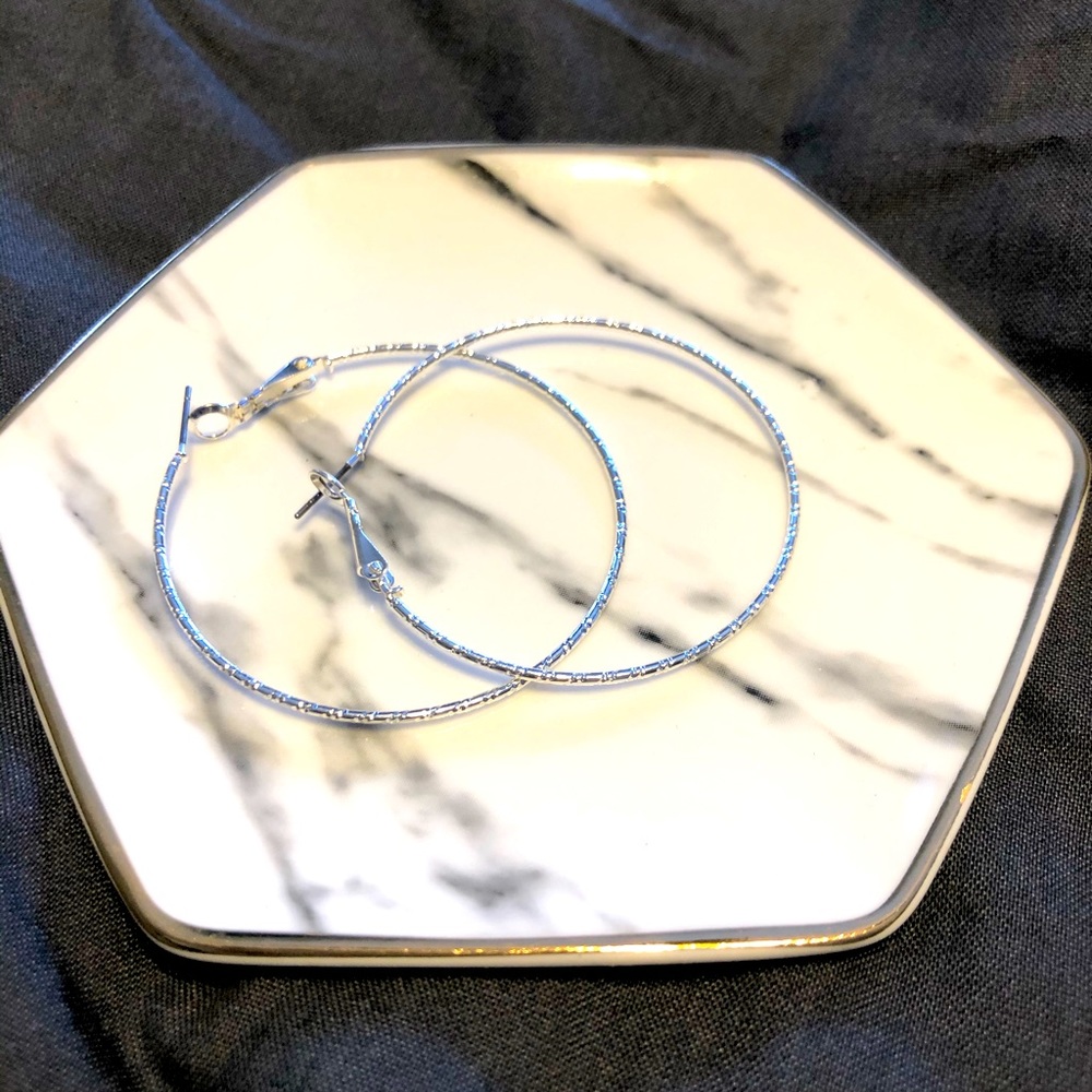 Silver hoop earrings brand new never worn